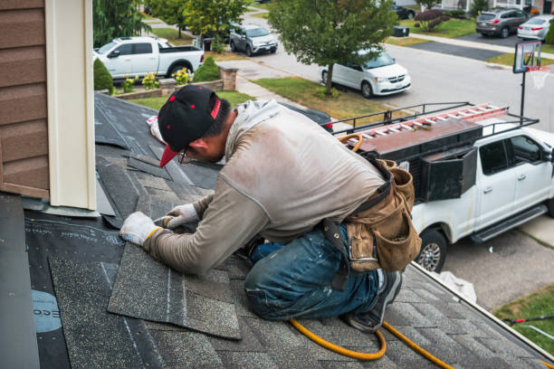 Professional Roofing technician working in Wayland, MI